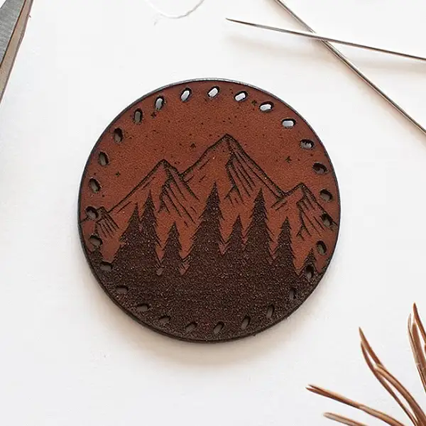 rounded picture leather patch